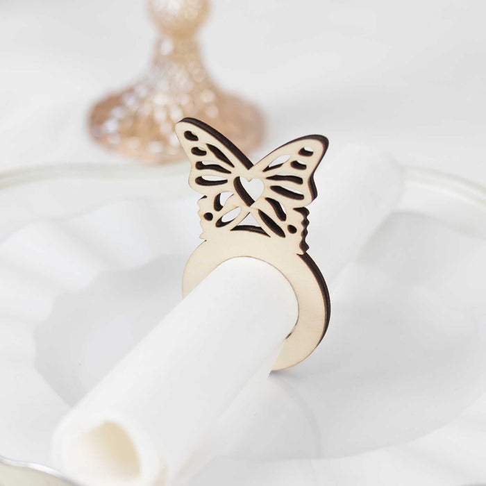 Butterfly napkin ring holder on a white plate