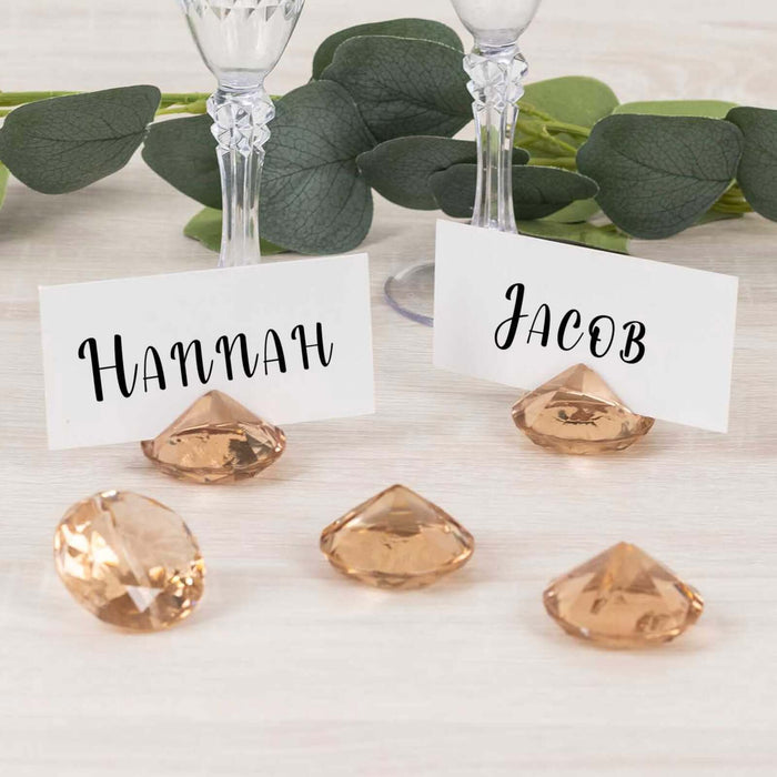 Table place card holders with name cards for weddings or events.