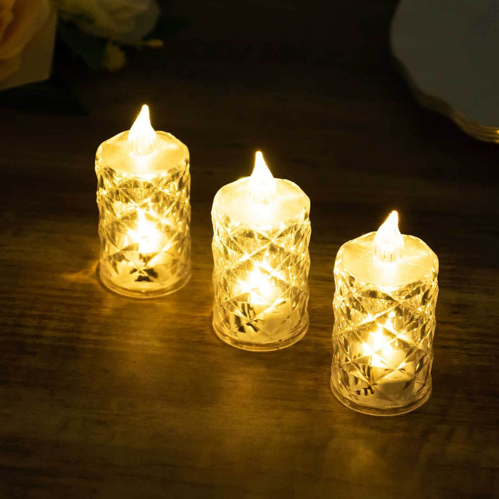 Set of three decorative LED candles with a warm glow.
