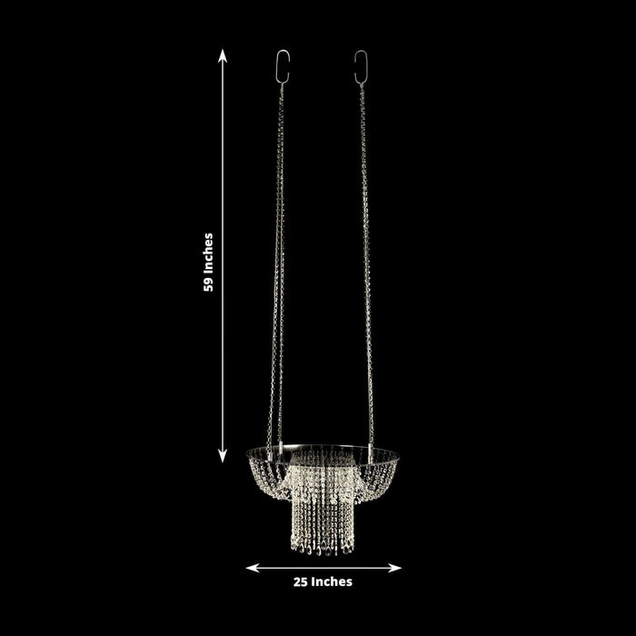 Chandelier with hanging crystals, 59 inches tall and 25 inches wide.
