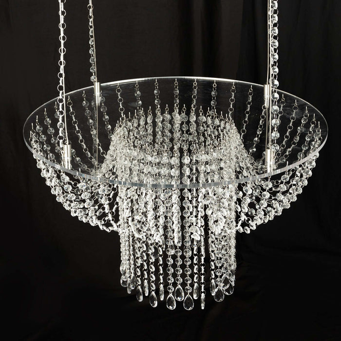 Modern crystal chandelier with cascading beads and sleek design.