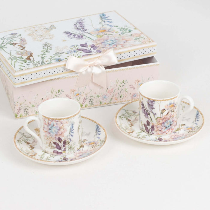 Floral porcelain teacups with matching saucers and decorative gift box