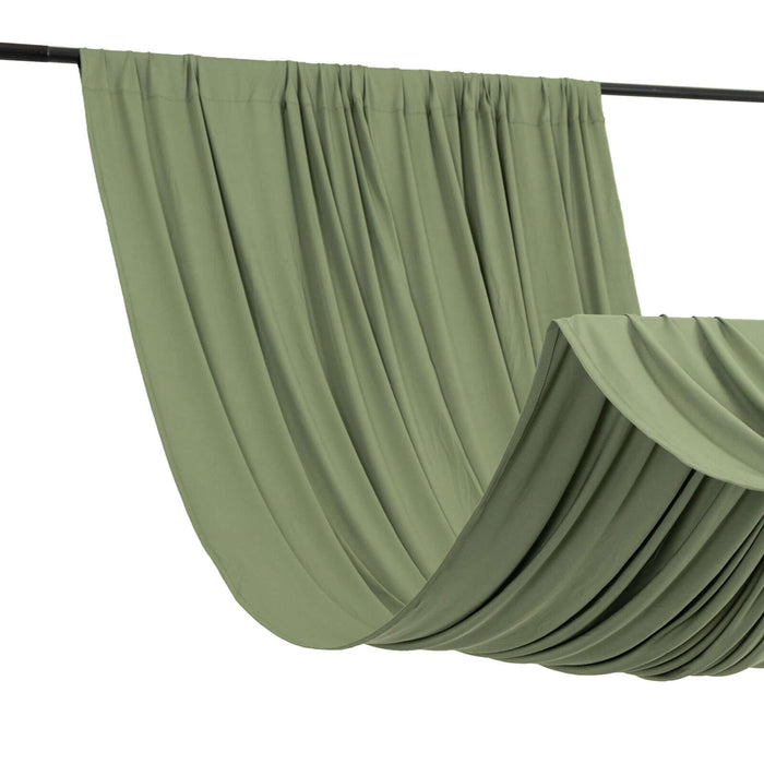 Green draped fabric hanging on a rod