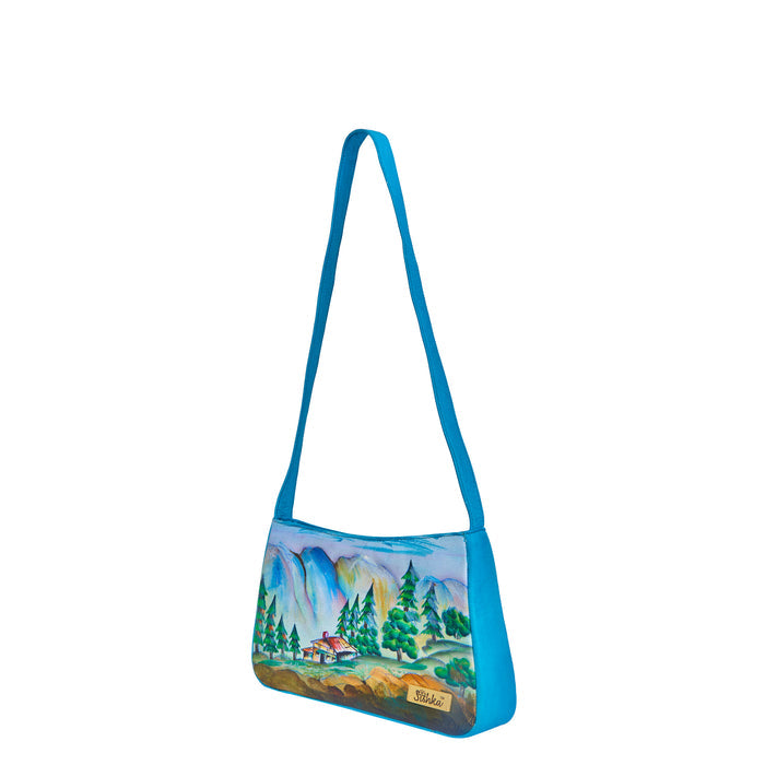 Women's mountain hand-painted leather shoulder bag for everyday use and trip-half side view