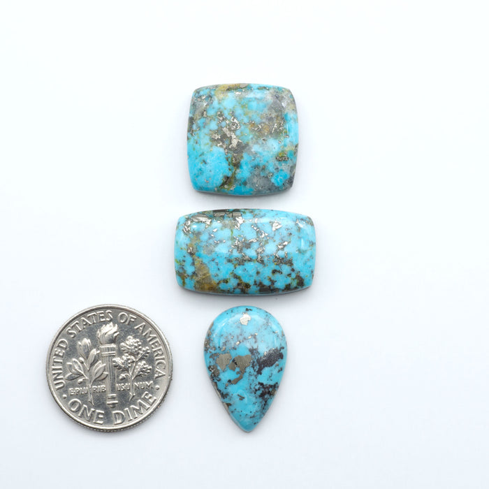 Nacozari turquoise cabochons are striking gemstones known for their vibrant blue to greenish-blue colors and pyrite, these stones are prized in jewelry making.