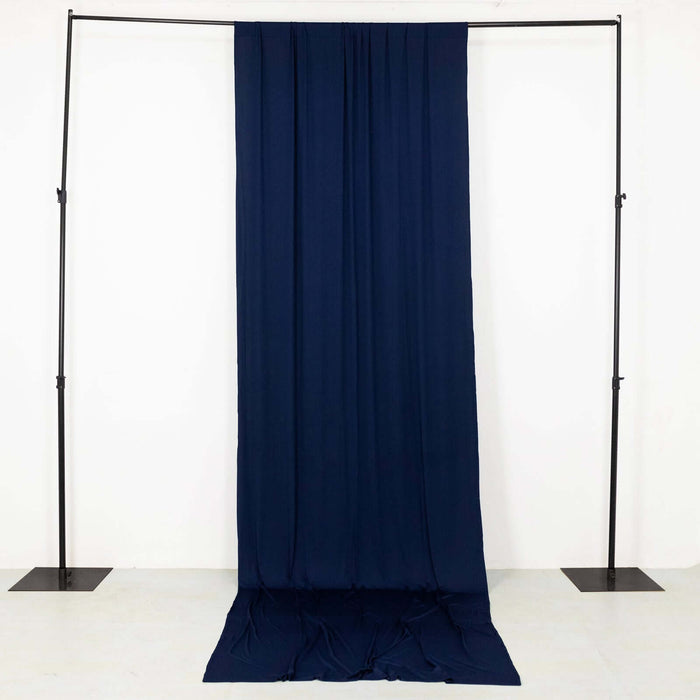 Navy blue fabric draped on a display stand against a plain background