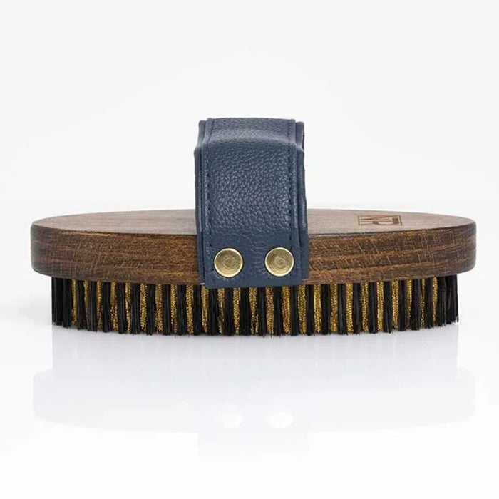 Side view of brush with dark wood back and blue leather handle.