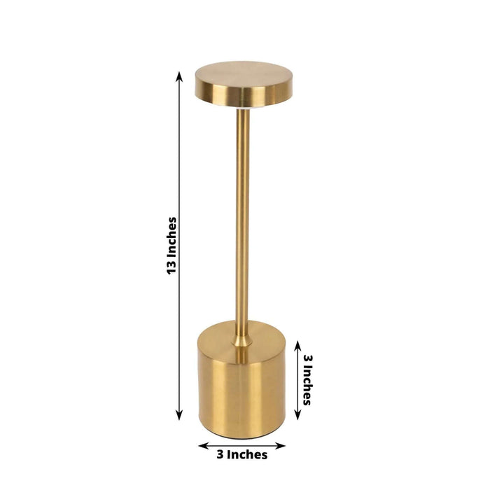 Gold metal lamp stand with a cylindrical base, 13 inches tall and 3 inches wide.