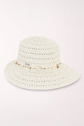 White woven hat with a shell detail