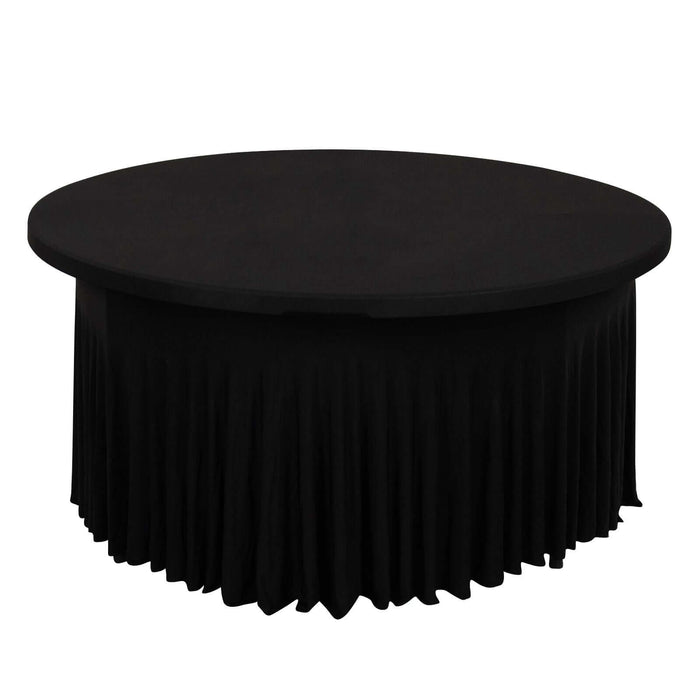 Black round table with pleated skirt on a plain white background.