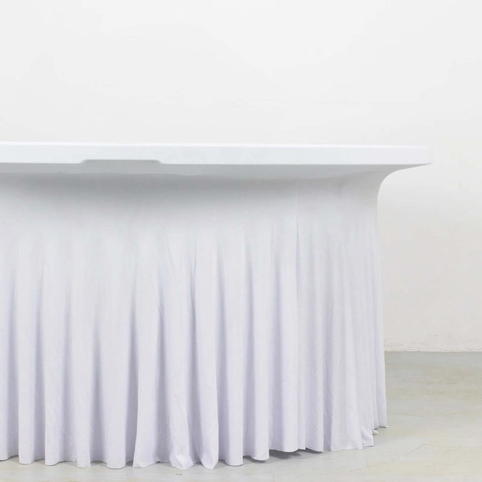 White table with a draped skirt, featuring a smooth surface and elegant design.