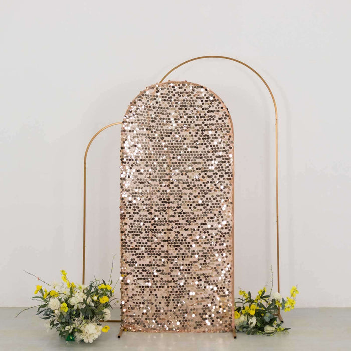 Sequin backdrop with gold frame and floral arrangements