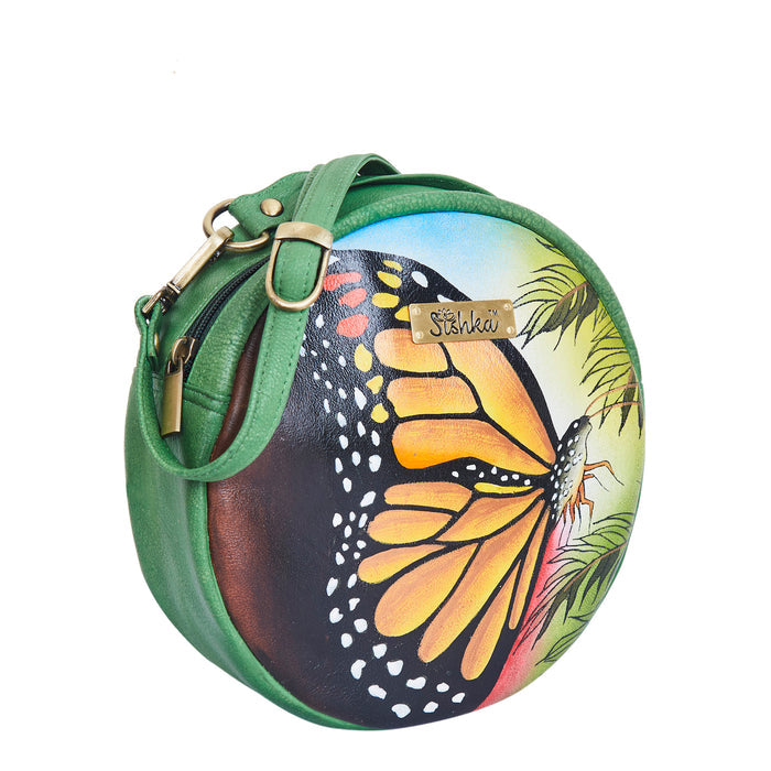 Women’s butterfly hand-painted leather oval crossbody bag for everyday use and travel, stylish crossbody sling bag-half side view
