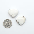 Natural White Buffalo Stone Cabochons are semi-precious gemstones cut into shapes ideal for jewelry-making, making them an excellent choice for artisans